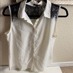 Sheer white blouse with black lace detailing